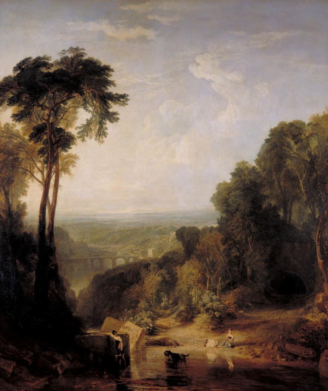 A wooded river valley in warm light, a bridge in the middle distance and a girl crossing a stream in front.